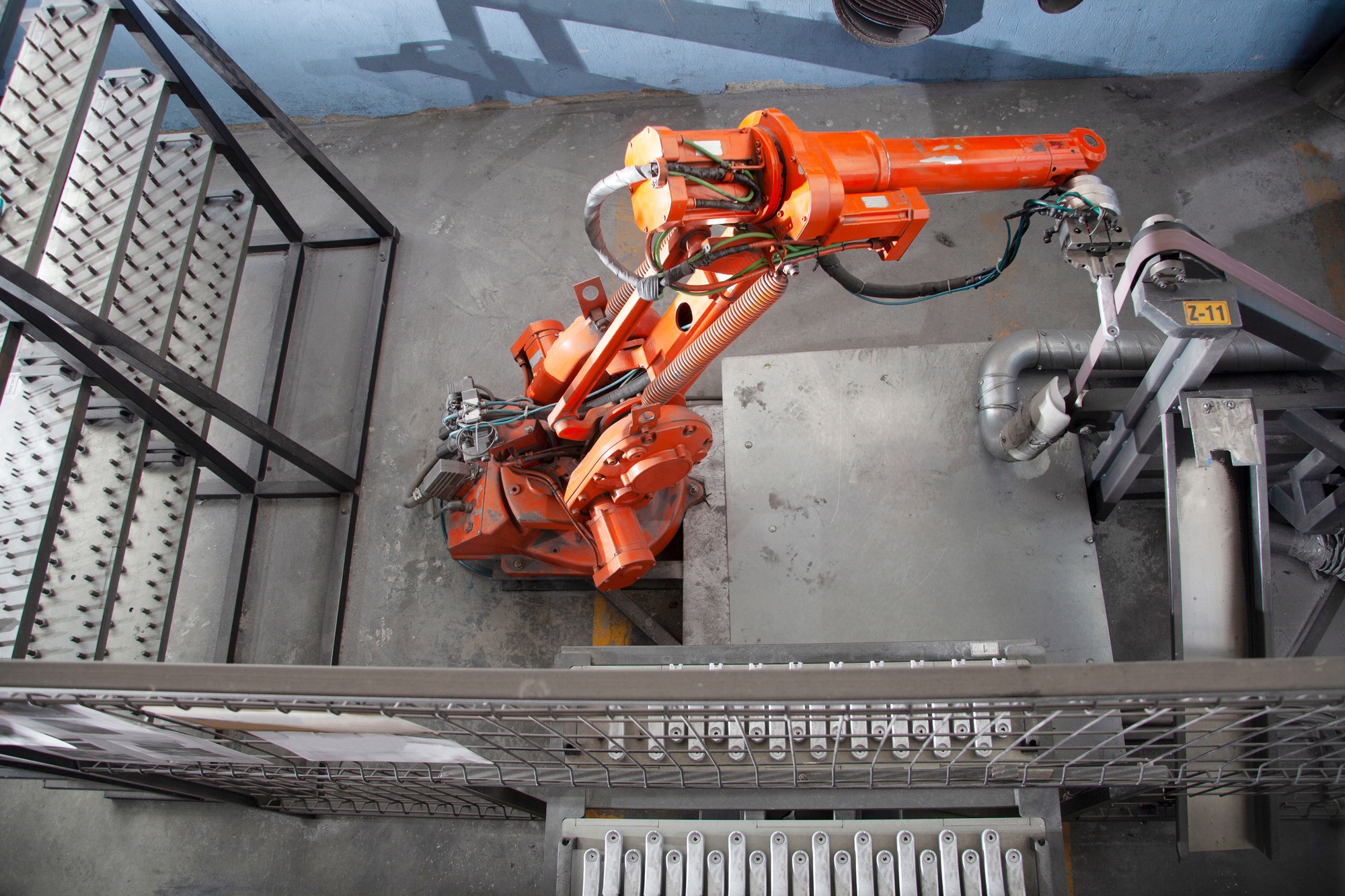 Robotic arm at industrial manufacture factory.